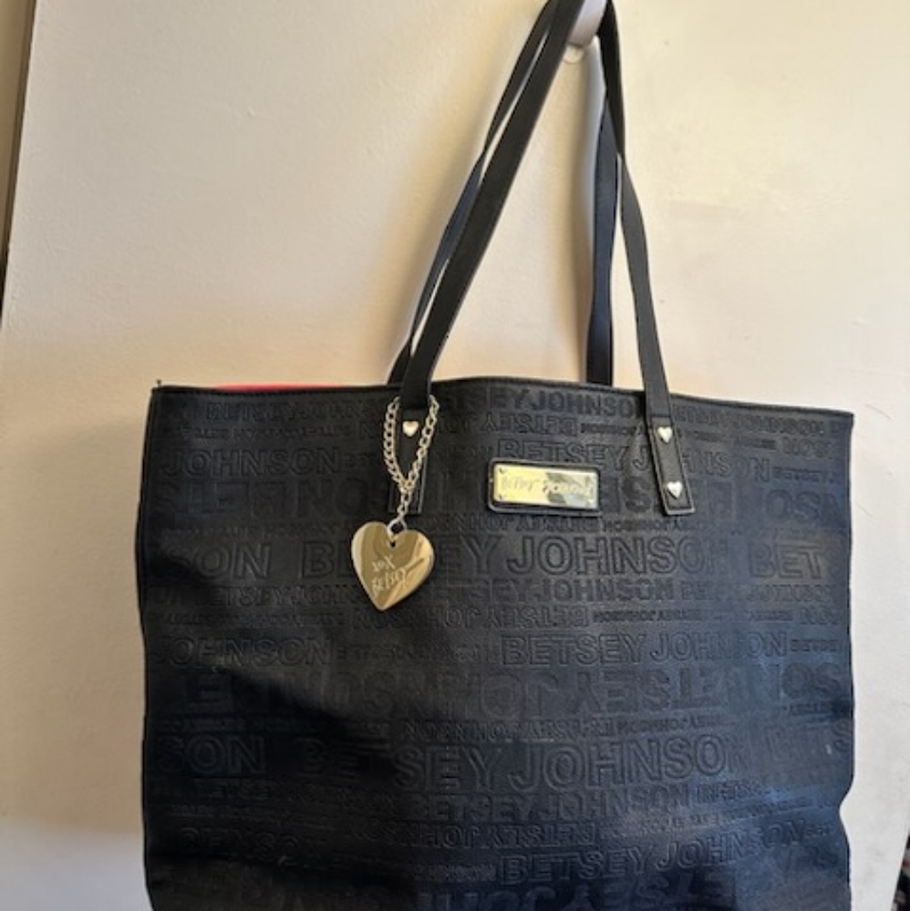 Black and red faux leather Betsey Johnson tote bag.